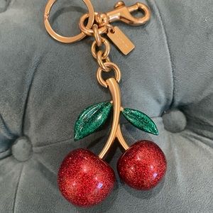 Coach cherry bag charm used